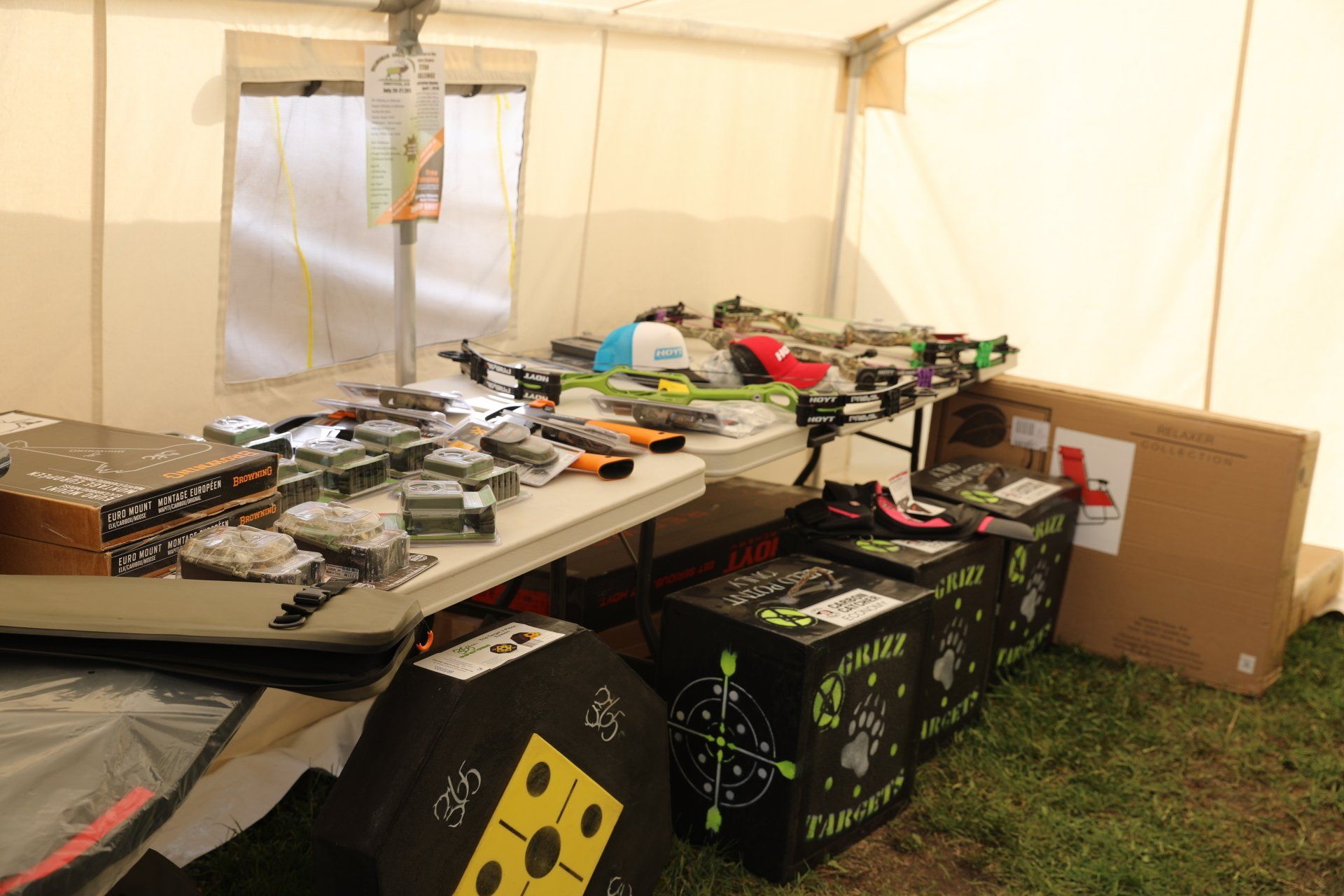 A tent filled with lots of boxes and toys.