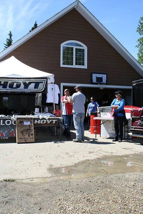A group of people standing in front of a hayt store