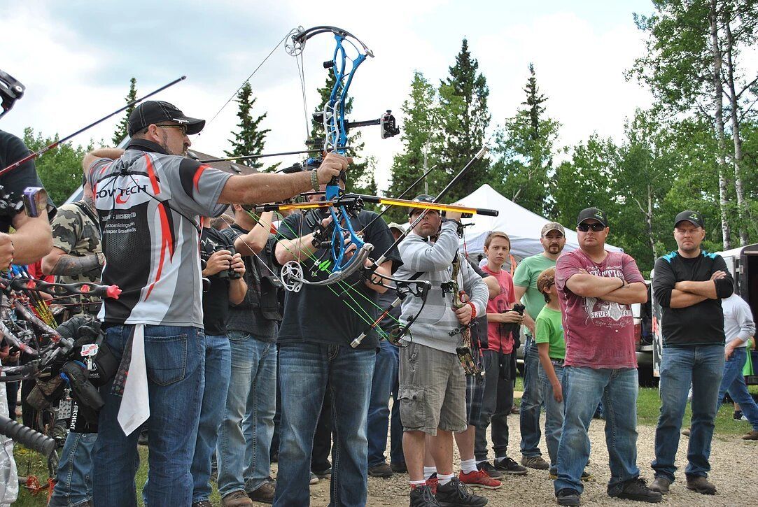Archer shooting arrow at target