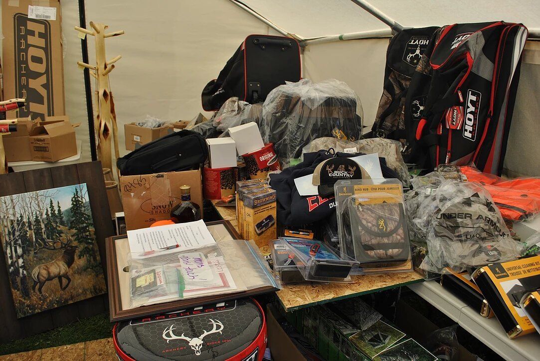 A bunch of items on a table including a box that says hoy