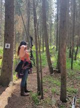 Archer shooting arrow at target