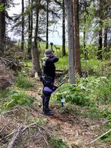 Man shooting arrow at target