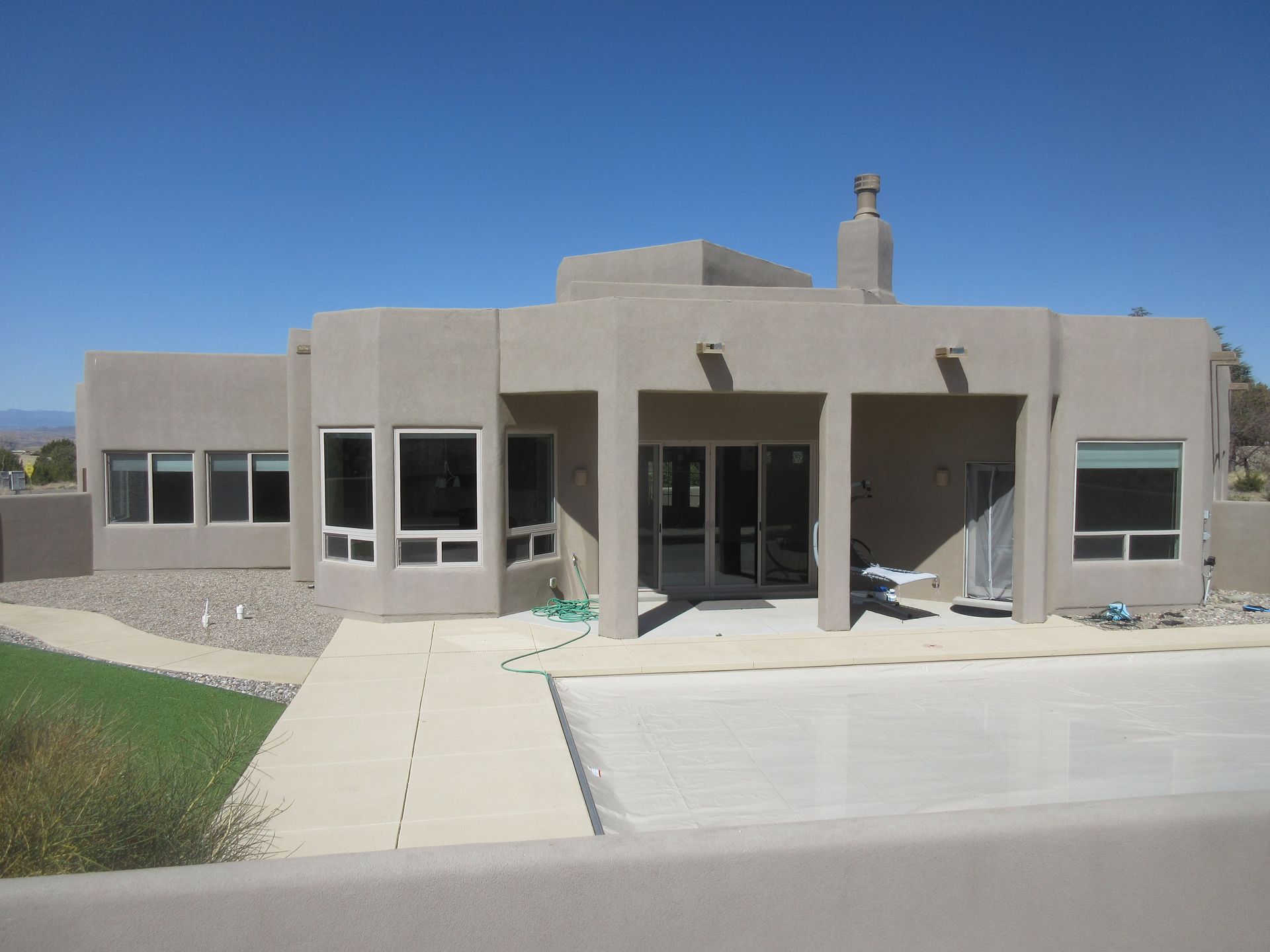 The outside front view of a rental property in Placitas, NM with Advantage Pointe Properties that is 3BDR/2BA/3CG