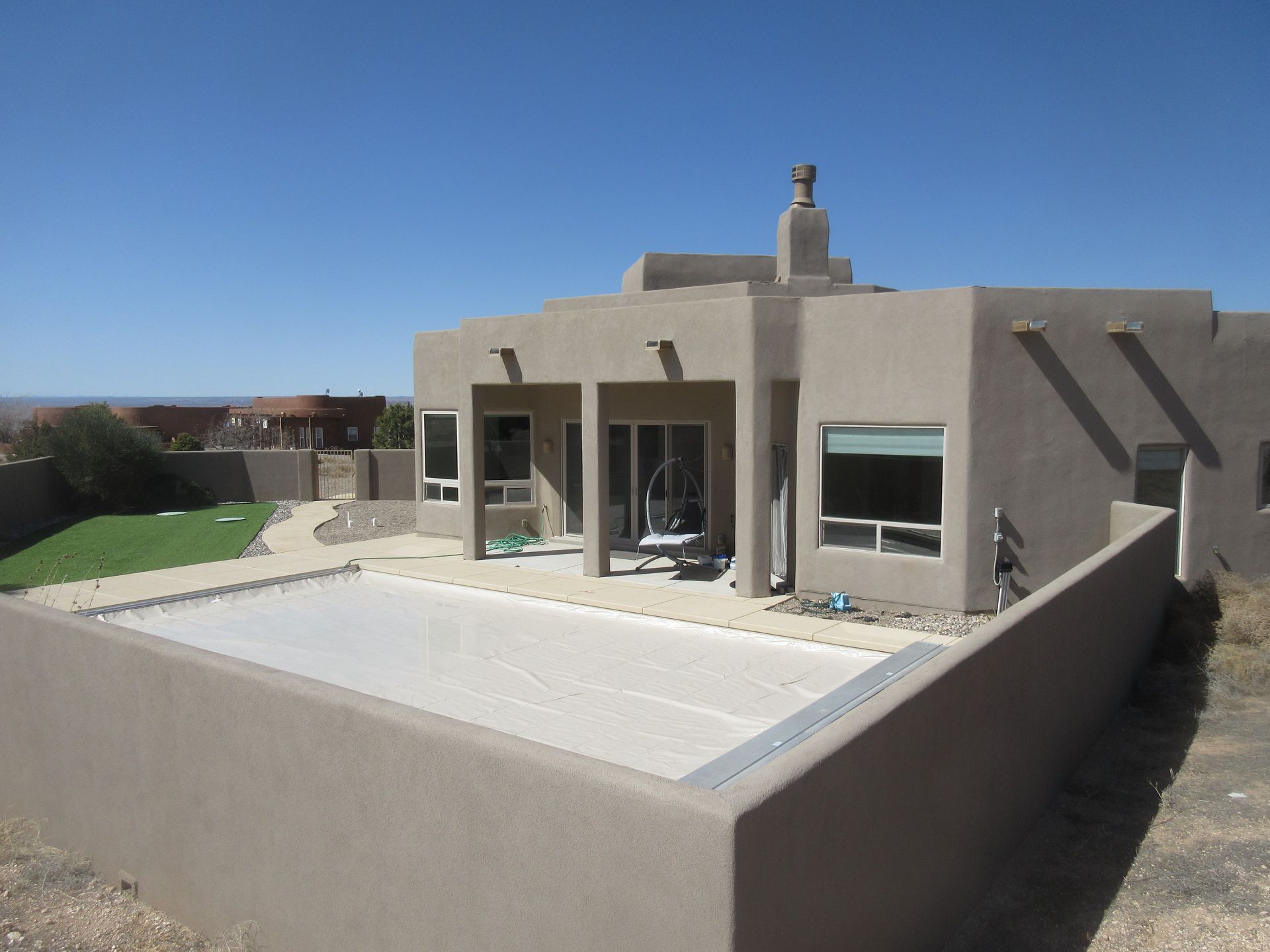 The outside front view of a rental property in Placitas, NM with Advantage Pointe Properties that is 3BDR/2BA/3CG