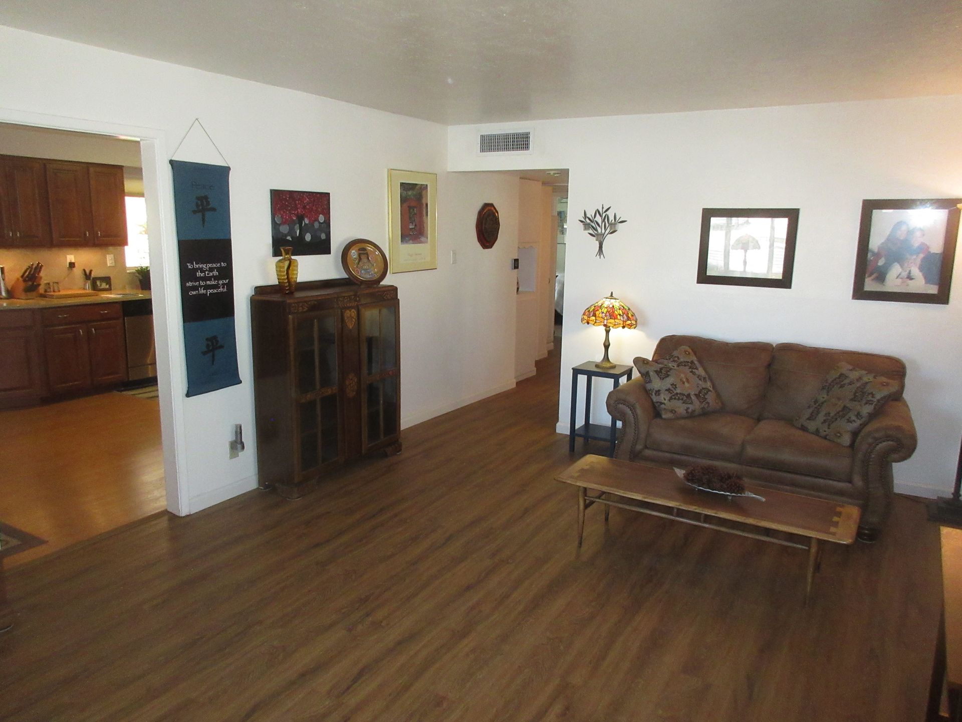 A living room with a couch and a coffee table
