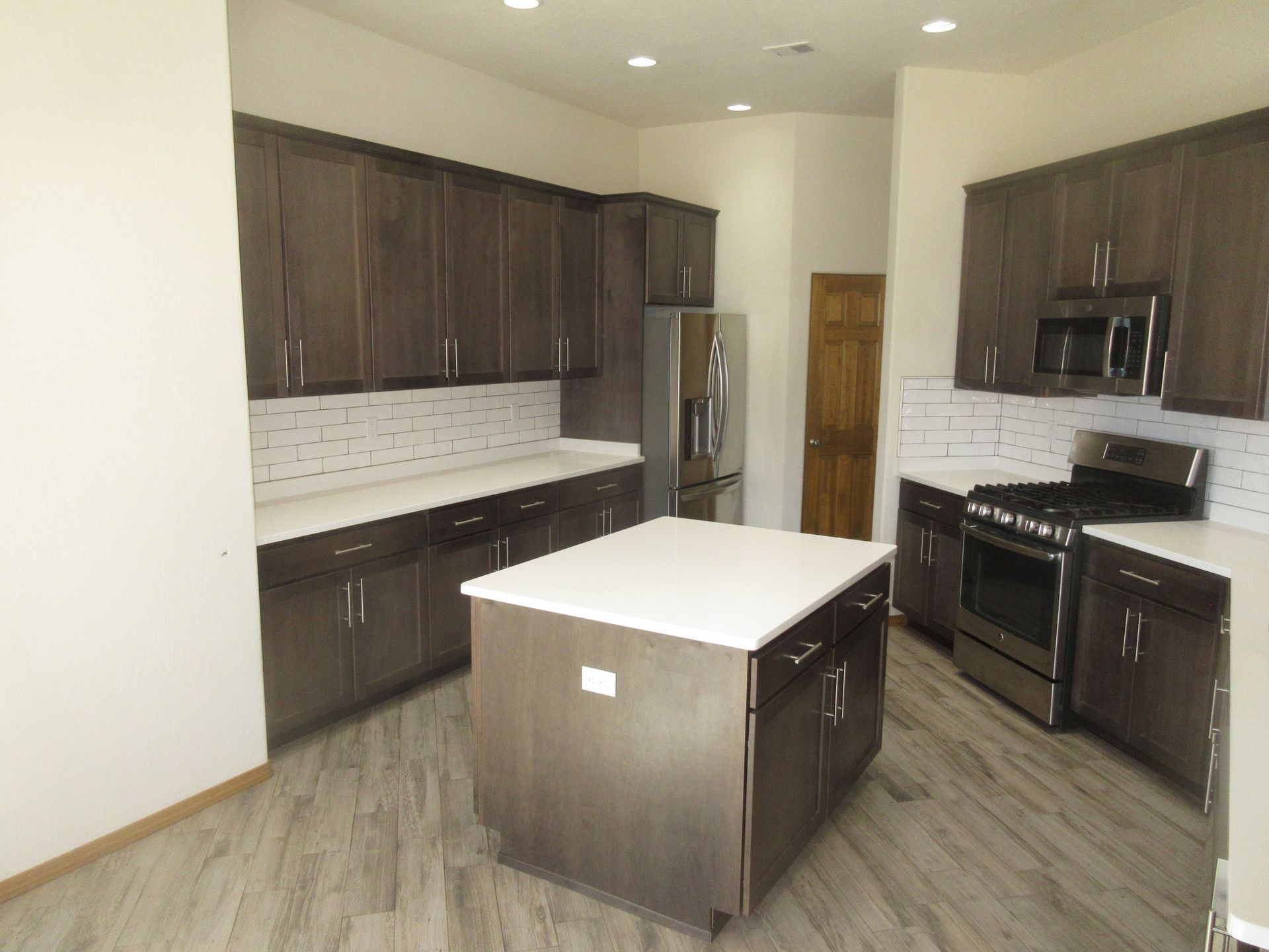 Inside view of the kitchen of a rental property in Placitas, NM with Advantage Pointe Properties that is 3BDR/2BA/3CG