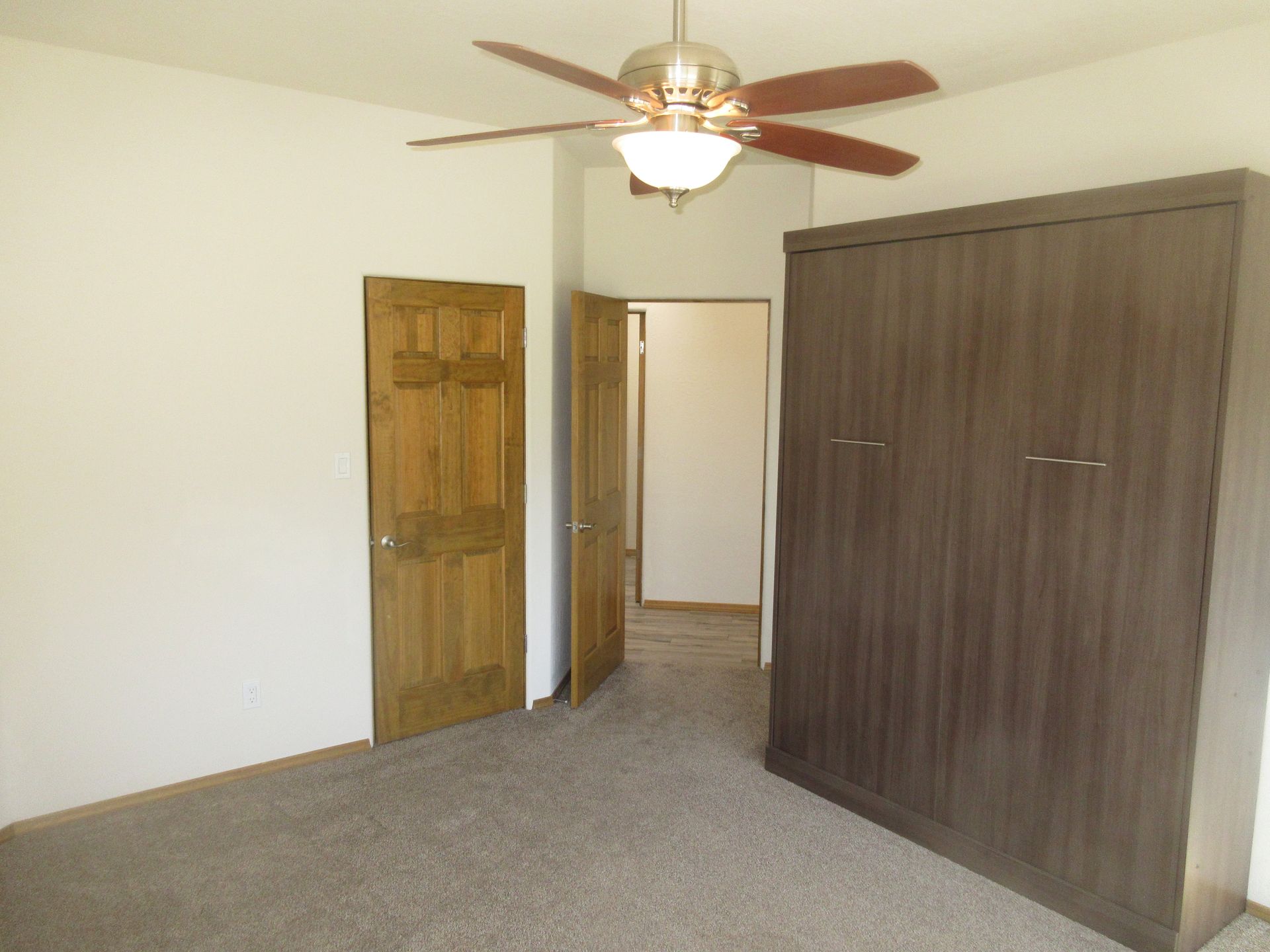 Inside view of the guest bedroom of a rental property in Placitas, NM with Advantage Pointe Properties that is 3BDR/2BA/3CG