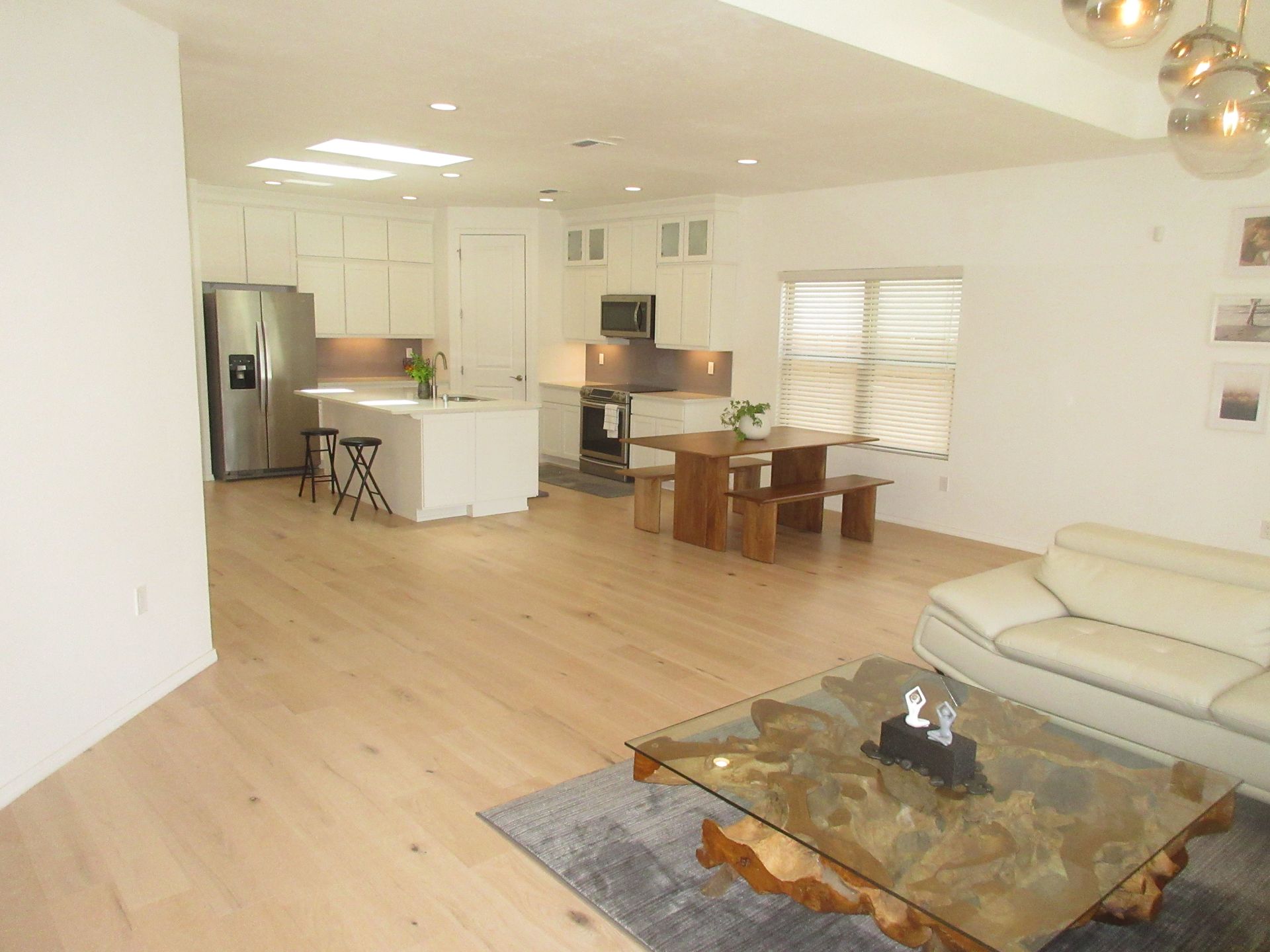A living room with a couch and a coffee table