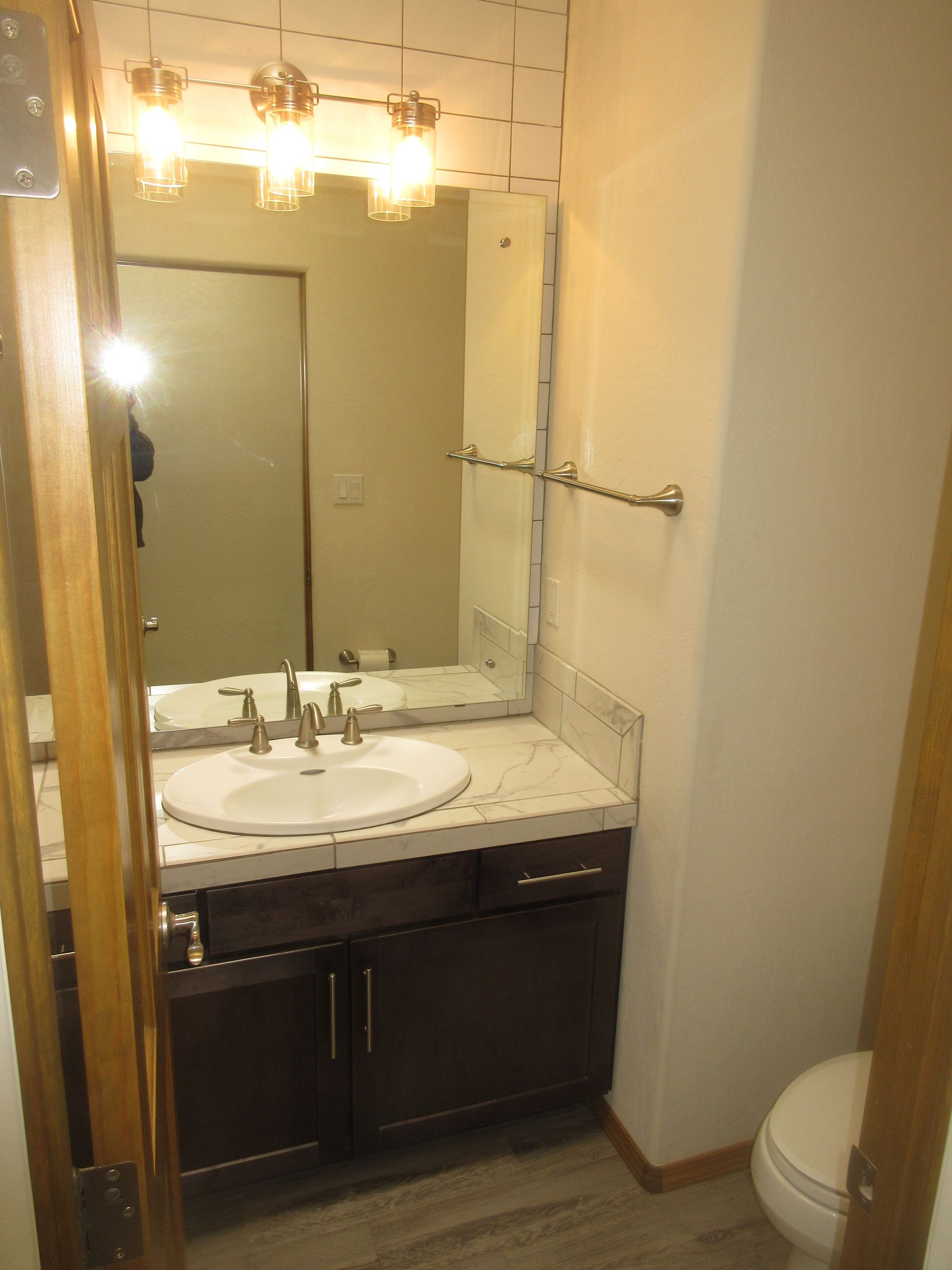Inside view of the guest bathroom of a rental property in Placitas, NM with Advantage Pointe Properties that is 3BDR/2BA/3CG