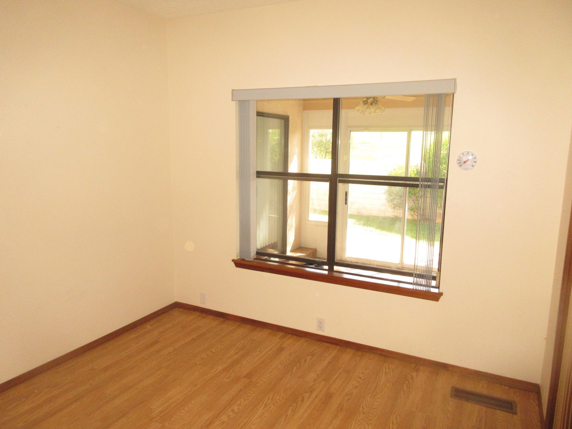 There is a large window in the middle of the room.