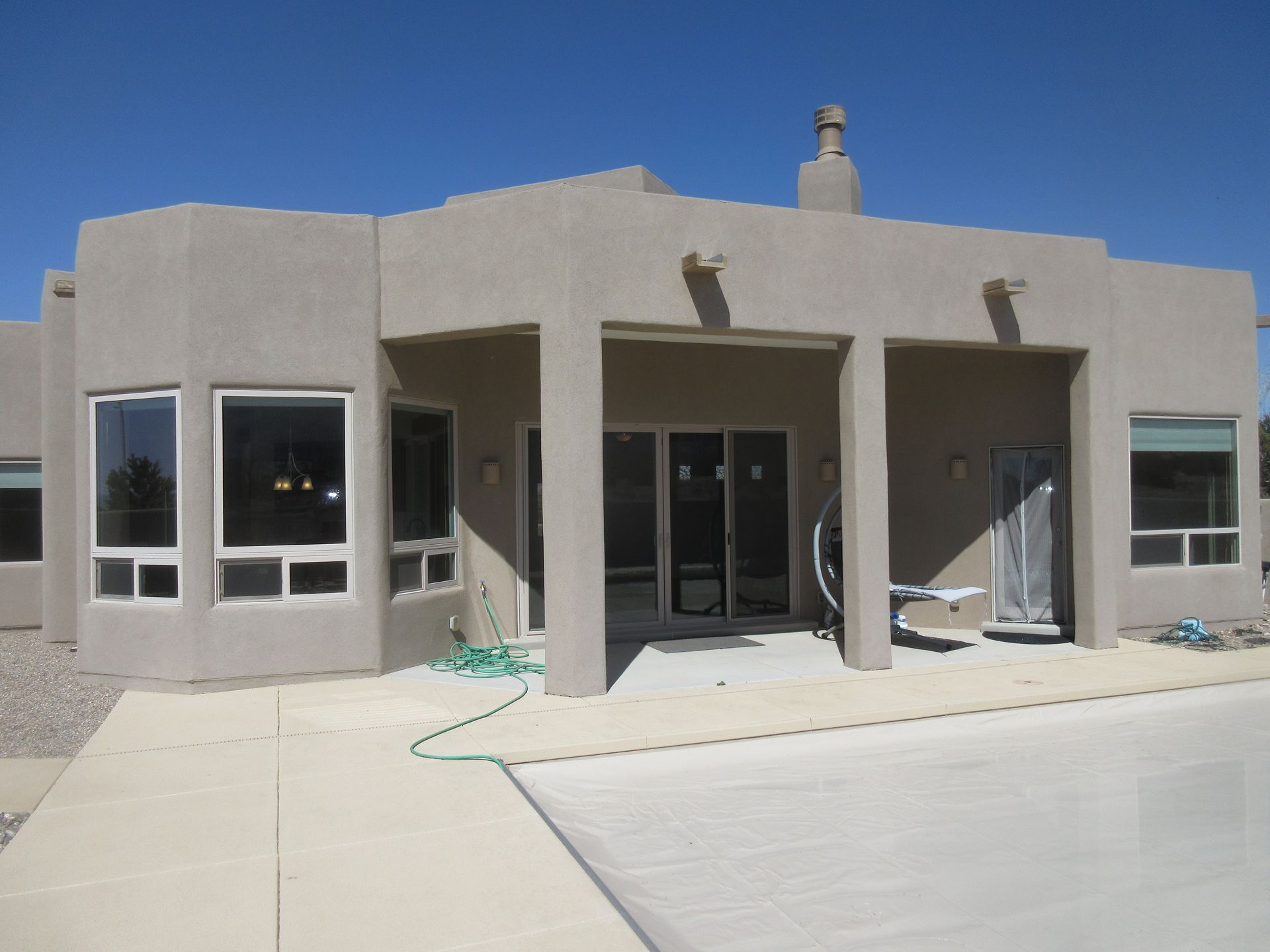 Outside view of the front patio of a rental property in Placitas, NM with Advantage Pointe Properties that is 3BDR/2BA/3CG