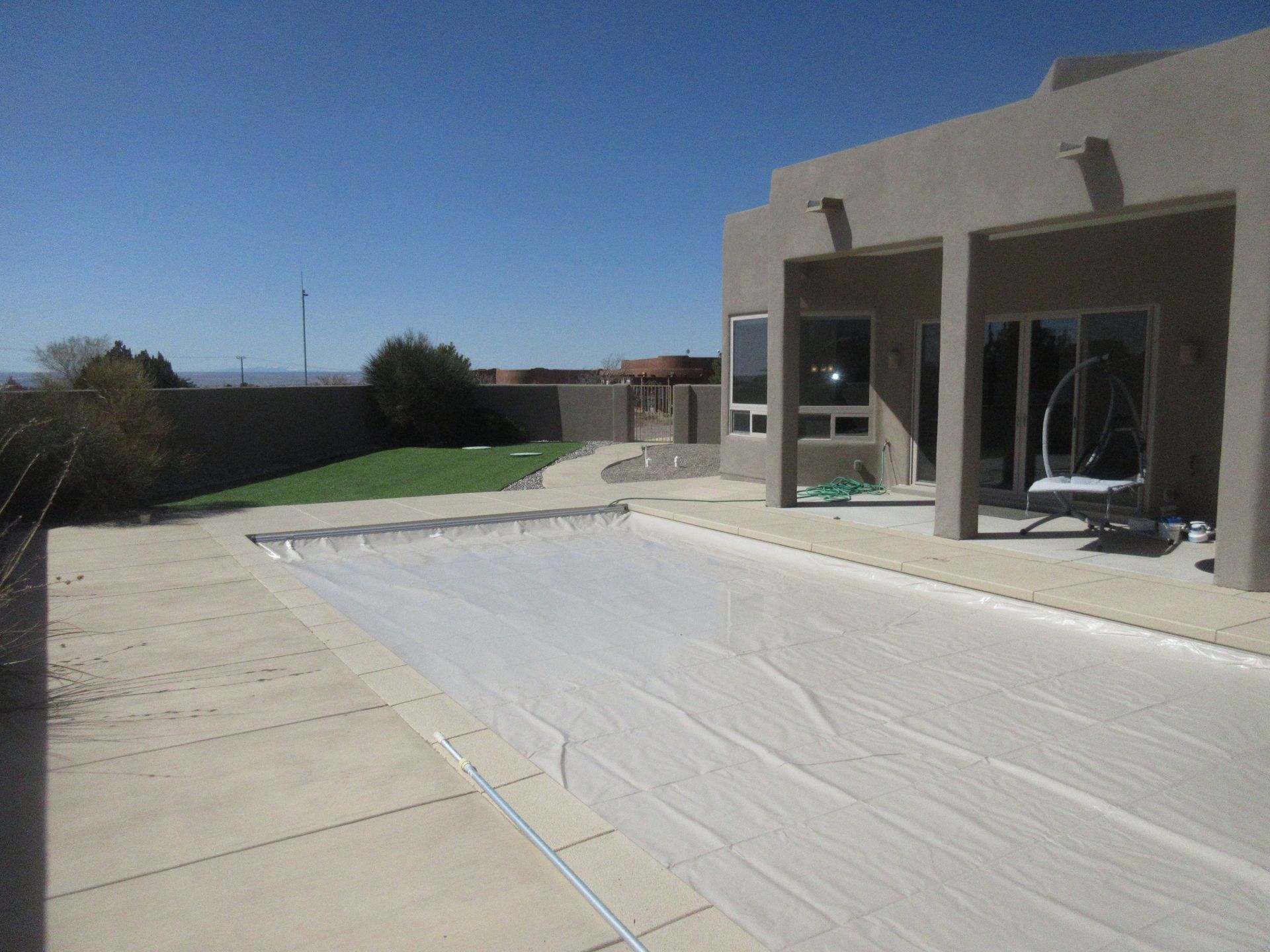 Outside view of the front patio of a rental property in Placitas, NM with Advantage Pointe Properties that is 3BDR/2BA/3CG