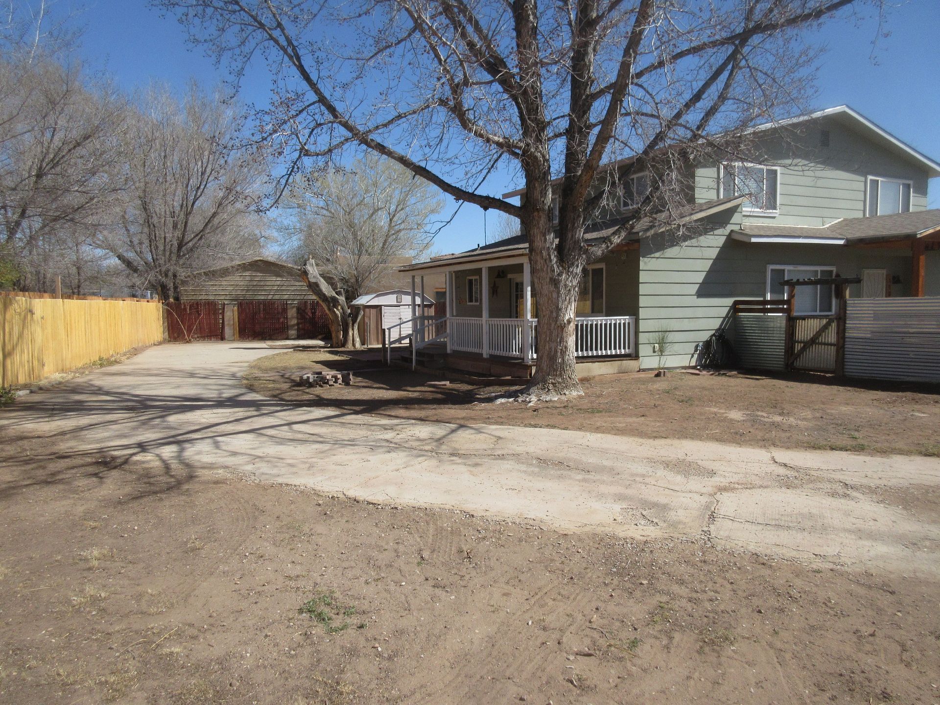 A house with a tree in front of it