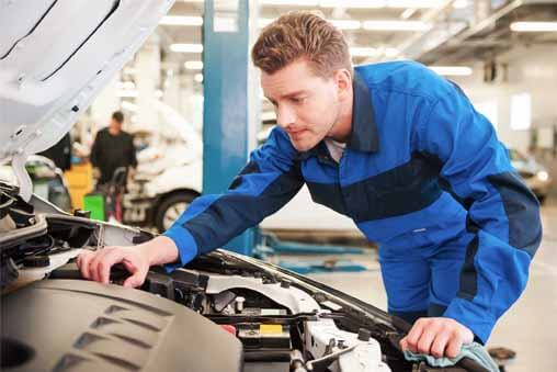 Mechanic Repairing a Car — Bro Muffler & Auto Repair in Huntington Beach, CA