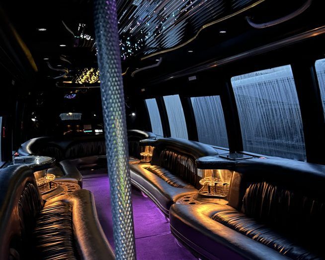 High end party bus interior with ambient lighting for luxury transportation in Atlanta
