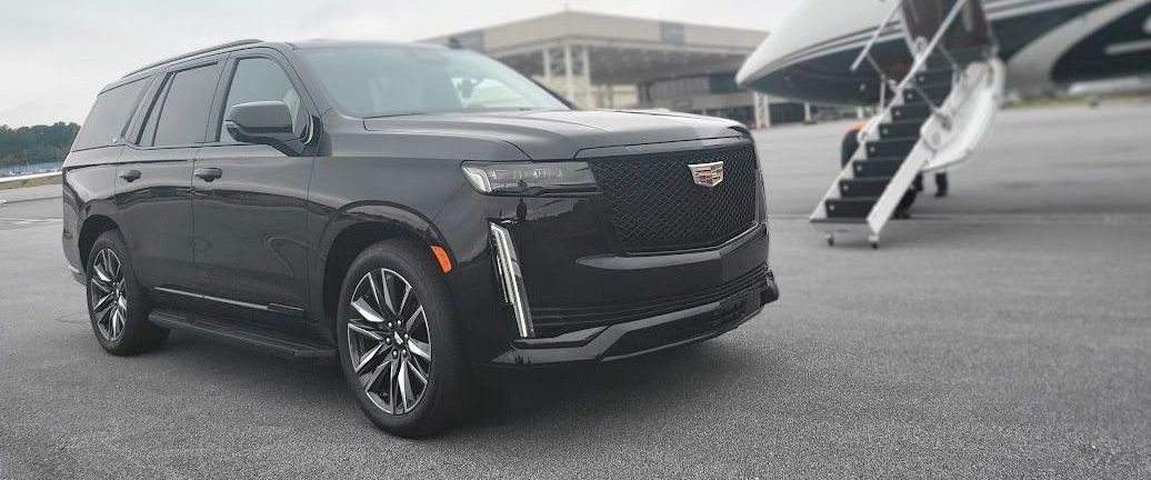 Black Cadillac Escalade luxury car service in Atlanta with concierge drivers

