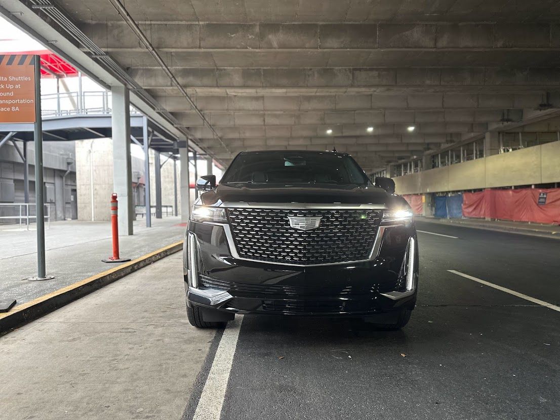 Atlanta black SUV and black truck service featuring Cadillac Escalade with personal driver
