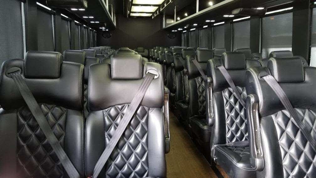 Luxury coach bus interior for group transportation and special events in Atlanta
