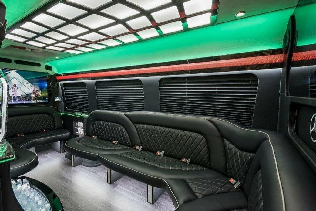 Private party bus limo interior for VIP group travel and special events in Atlanta
