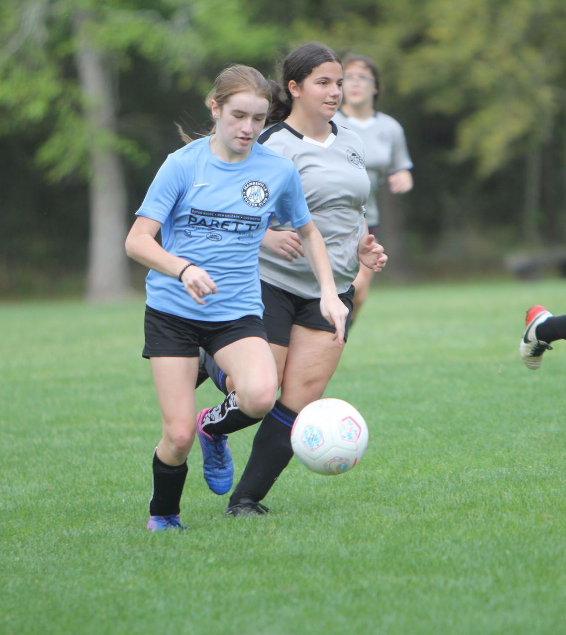 A young soccer player for Mandeville Soccer Club