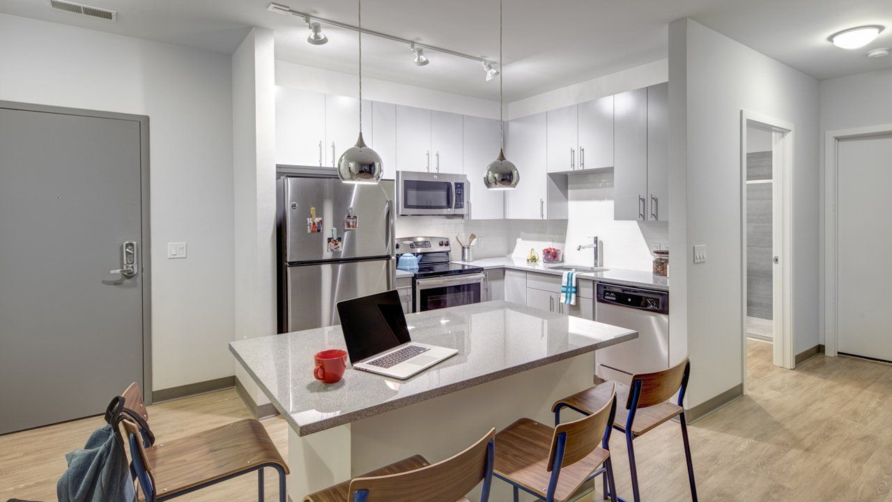 Apartment kitchen with upgraded appliances at West Quad.