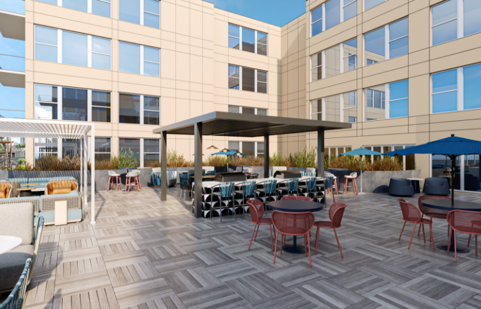 exterior space with tables and chairs at Wrenmoor LoHi