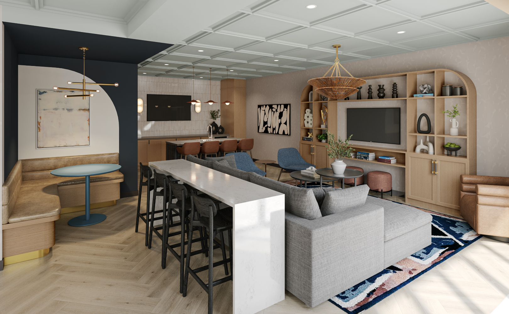A clubhouse with a couch , table , chairs and a television.