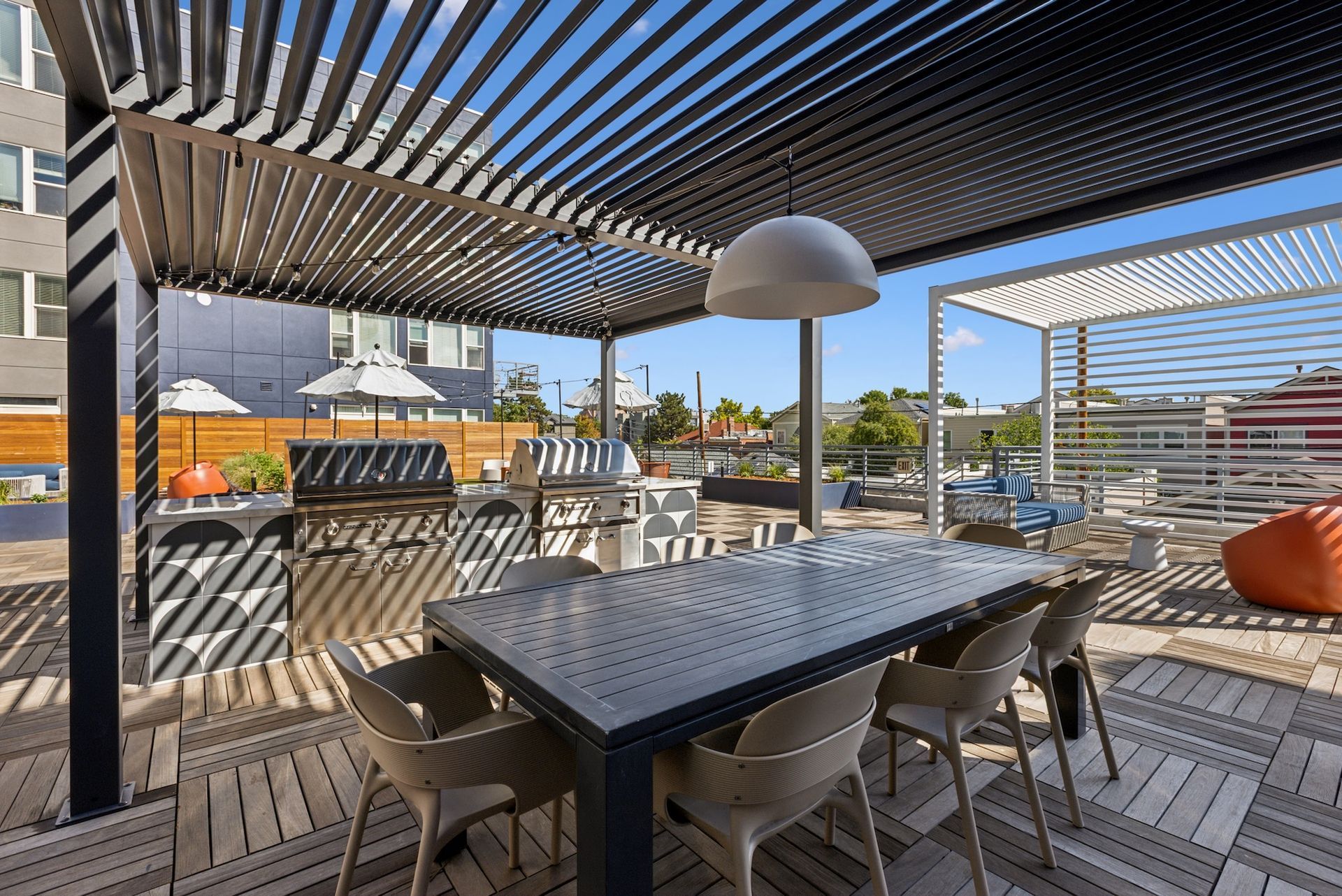 exterior space with tables and chairs at Wrenmoor LoHi