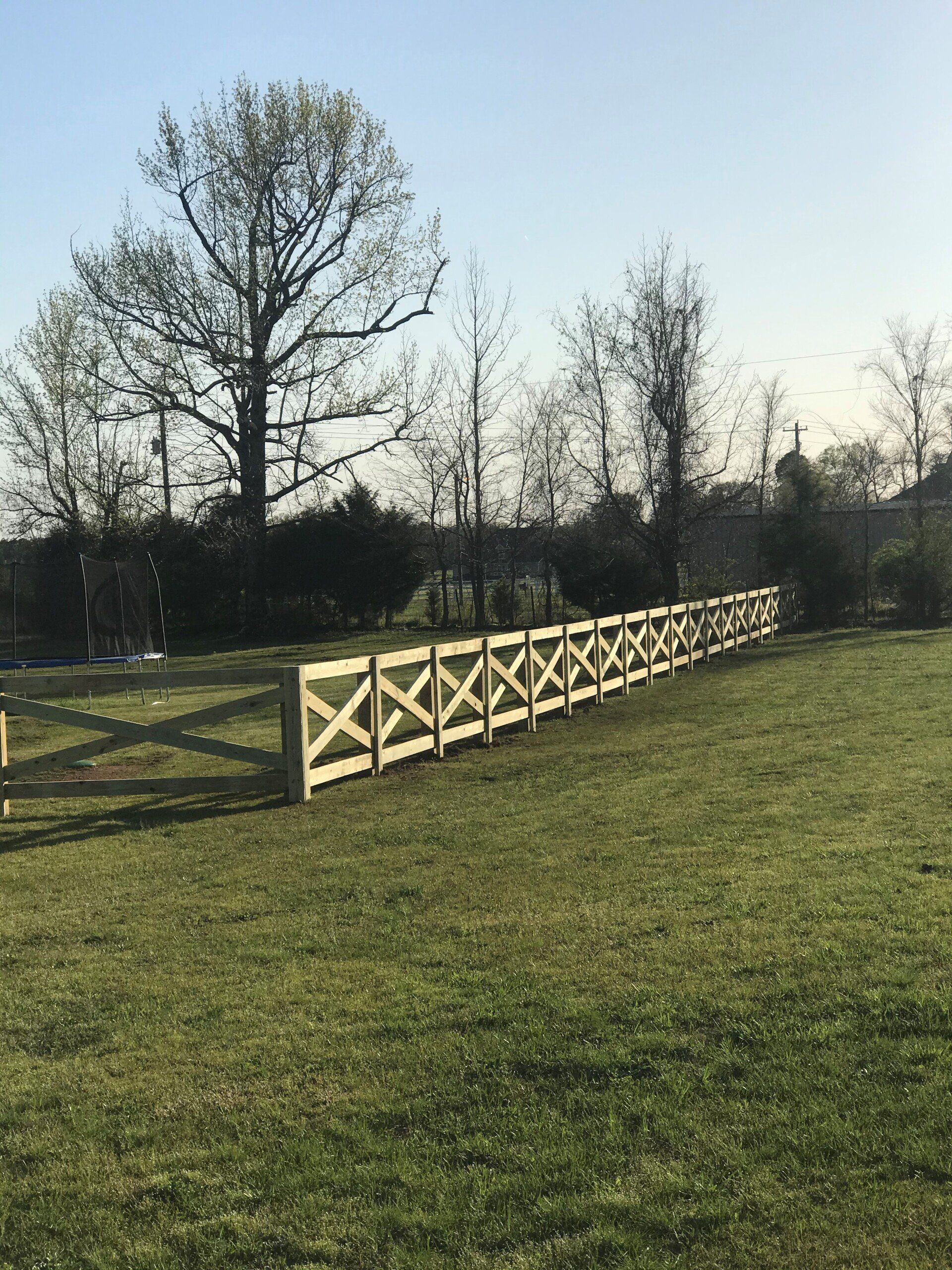 Wood Fence With Cross Design — Benton, AR — McDonald Fence Inc.