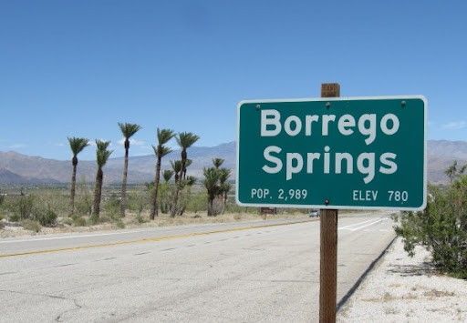 A green sign that says 
