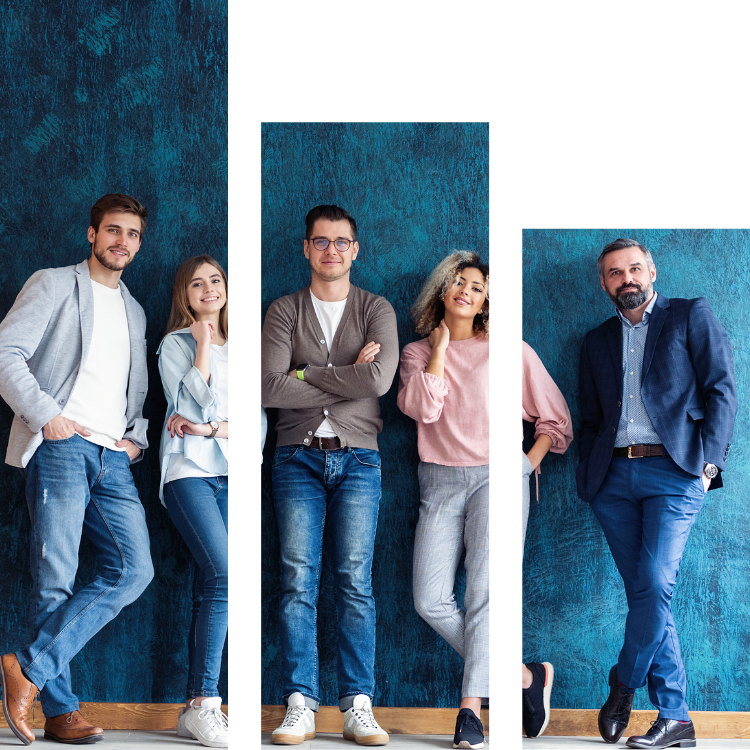 A group of people standing in front of a blue wall