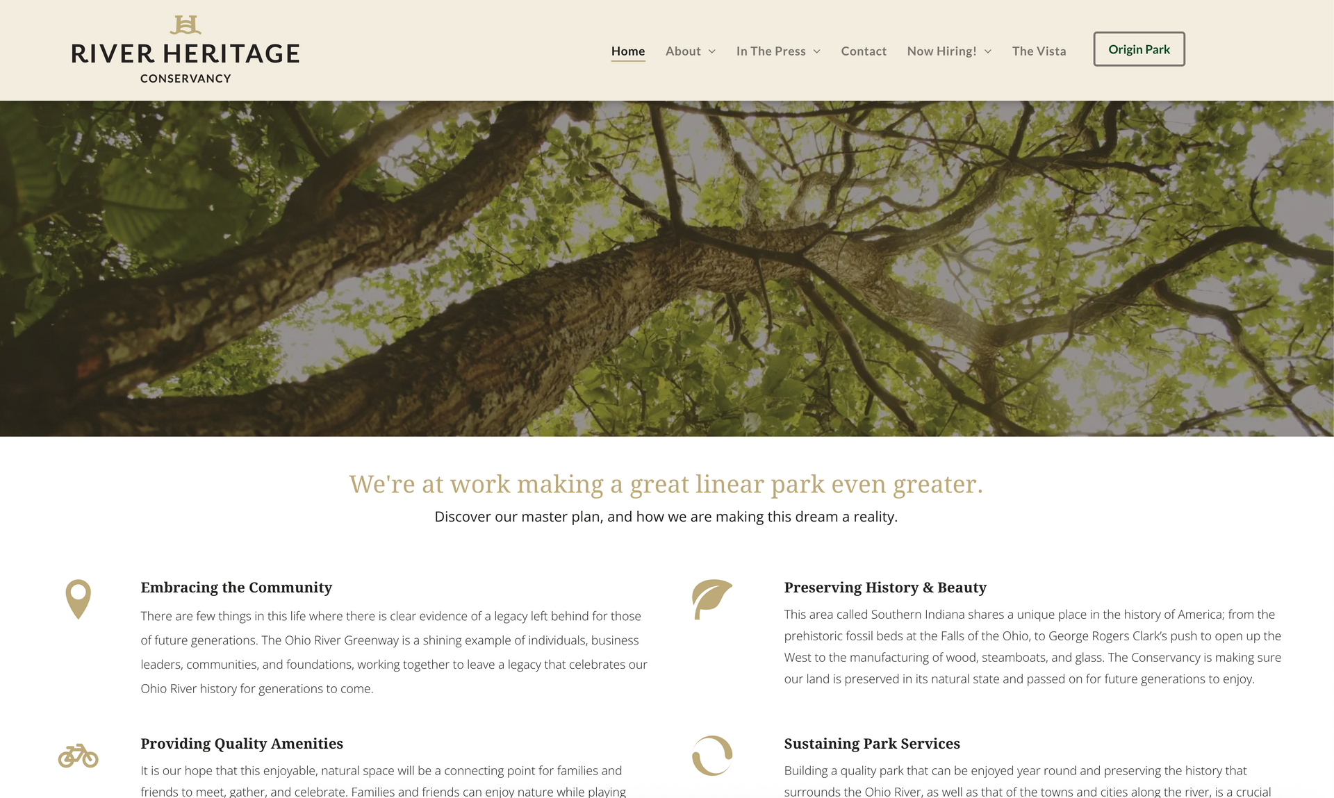 Website header with tree branches, text: