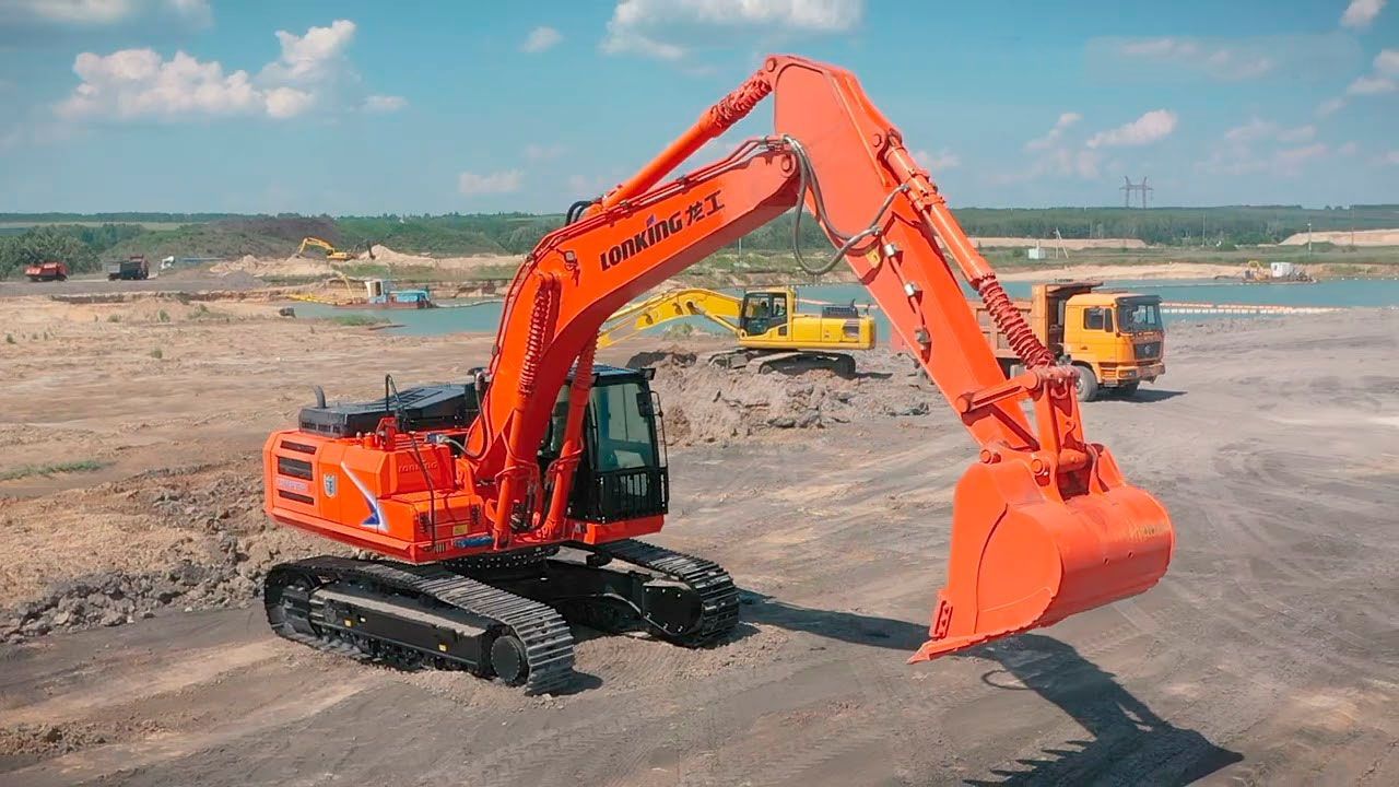 Orange Lonking crawler excavator operating at Dubai construction site with raised bucket