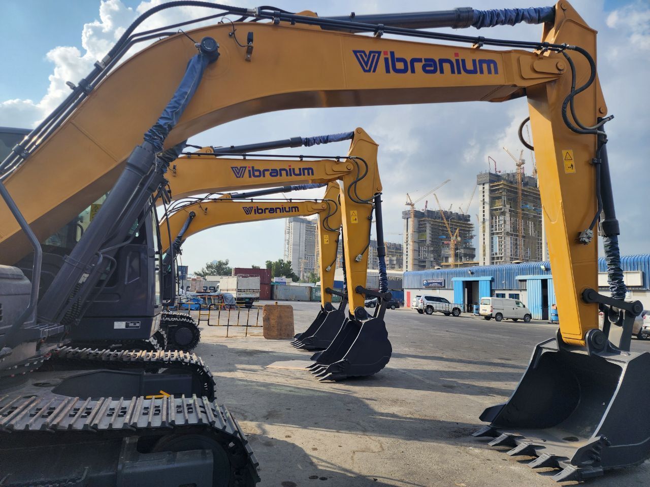 Multiple Lonking excavators with Vibranium branding parked in a row at Dubai equipment yard