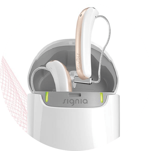 Et par høreapparater i en signia opladningsetui