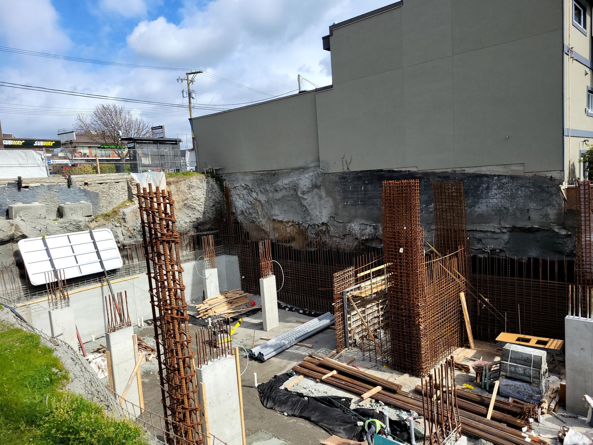 Concrete pillars being created from rebar and concrete mix