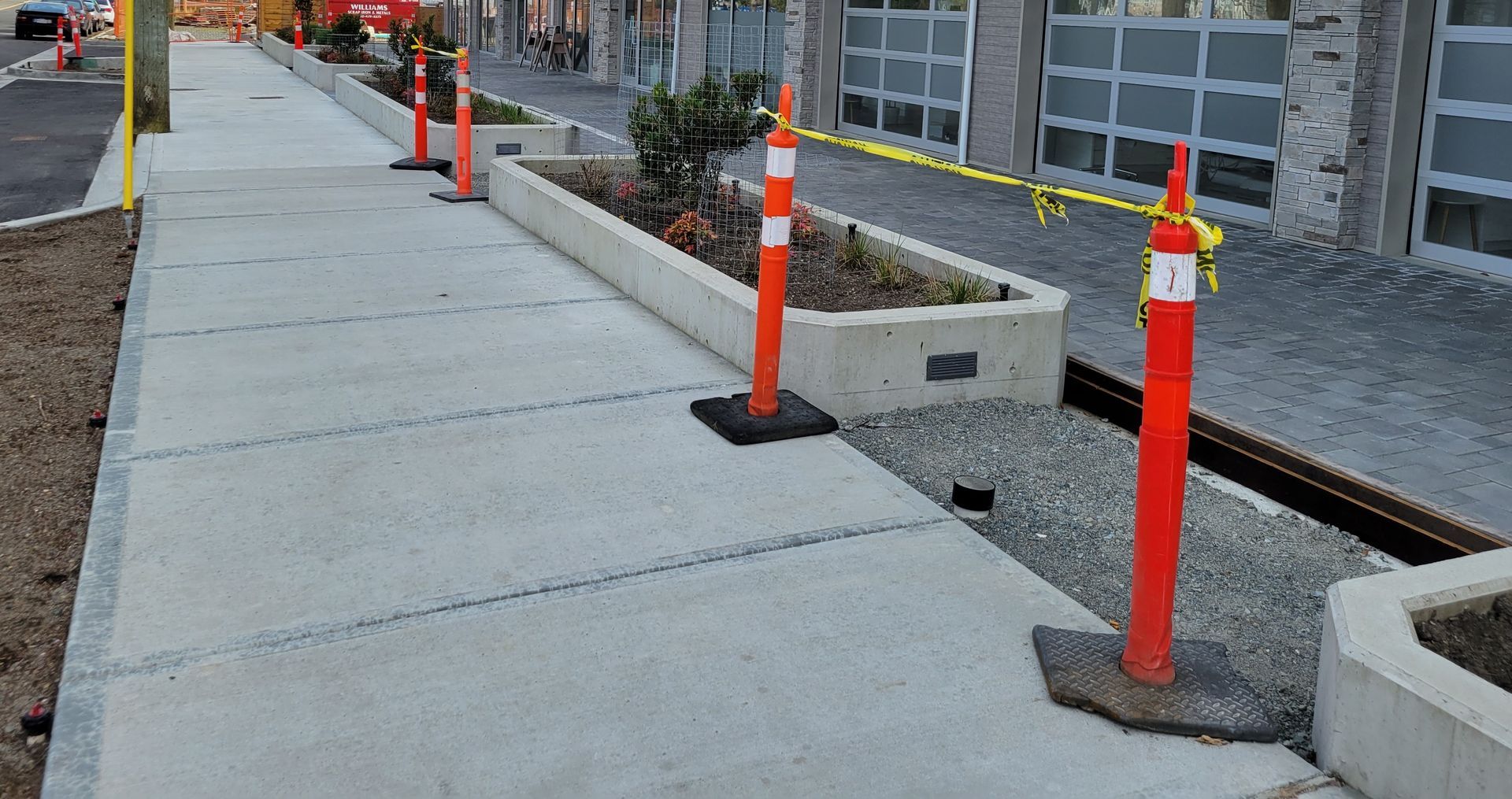 concrete sidewalk and planters
