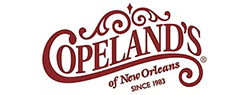 Copeland's restaurant logo in maroon with decorative swirls and text