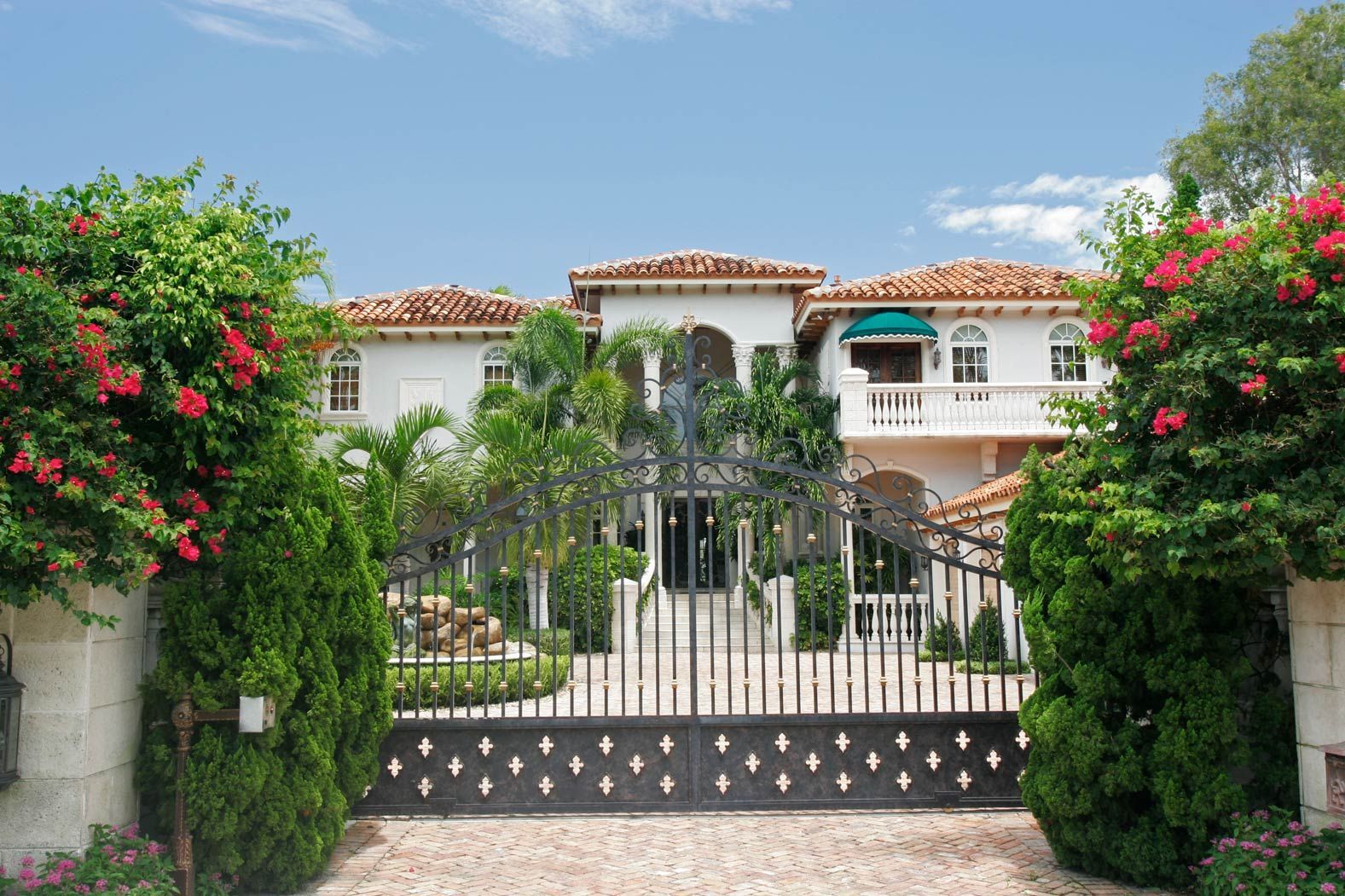 Residential wrought iron gate showcasing security gate installation in Gilroy, CA, combining elegance and safety.