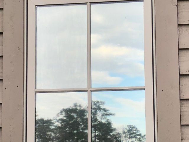 home window tint Wetumpka AL — exterior view of SPF Tinted window in Wetumpka AL
