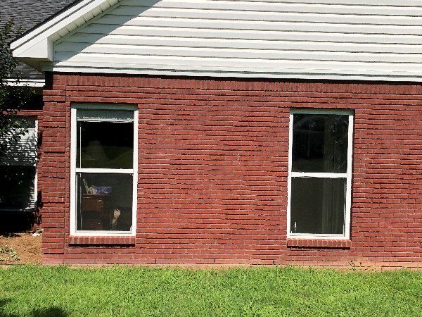 Commercial Tint Holtville — Brick Wall with Tinted Windows 1 in Montgomery, AL