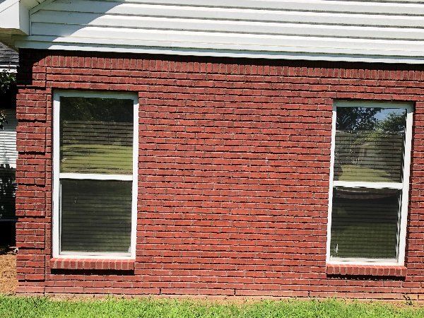 Residential Tinting Holtville — Brick Wall with Tinted Windows 2 in Montgomery, AL