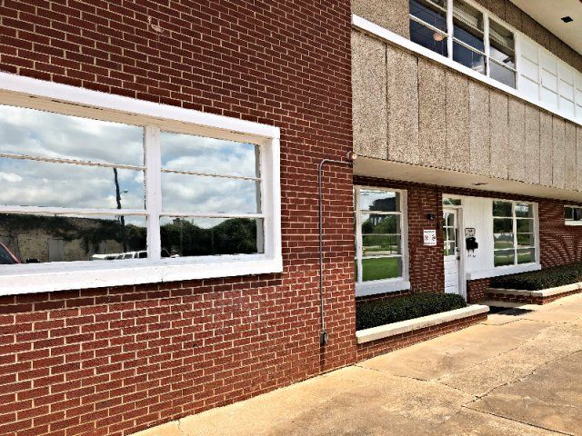Professional Office Tint Provider — Tinted Glass 26 in Montgomery, AL