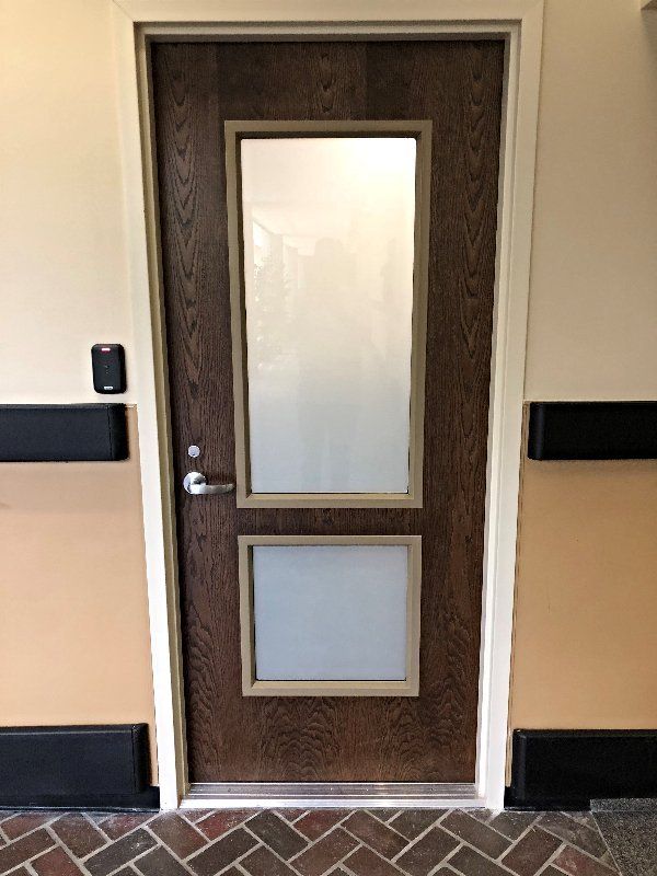 ballistic glass - add the right level of safety fortification to prevent a breach through the glass windows.