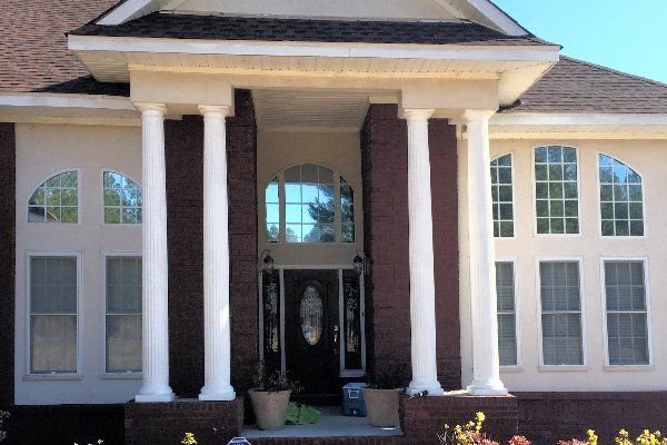 Residential Tinting Tallassee — Brown House with Tinted Windows in Montgomery, AL