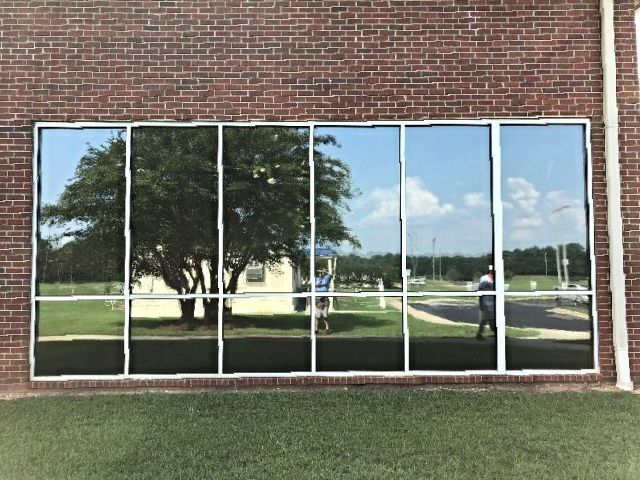 Commercial Tint Tallassee AL — Building windows with real SPF Tint blocking record heat gain from windows in Tallassee AL