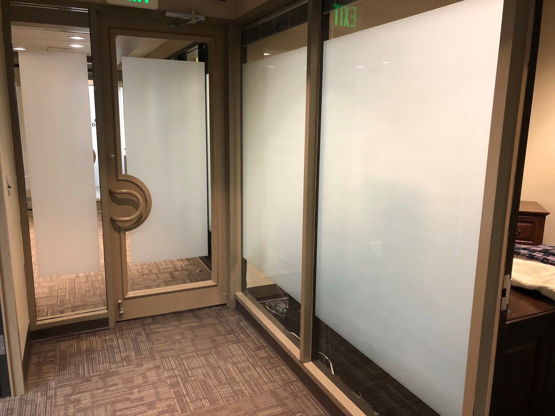 Frost Tint Office Glass Installation - White Frost Precision Cut Scapes tints the window adding subtle elegance.