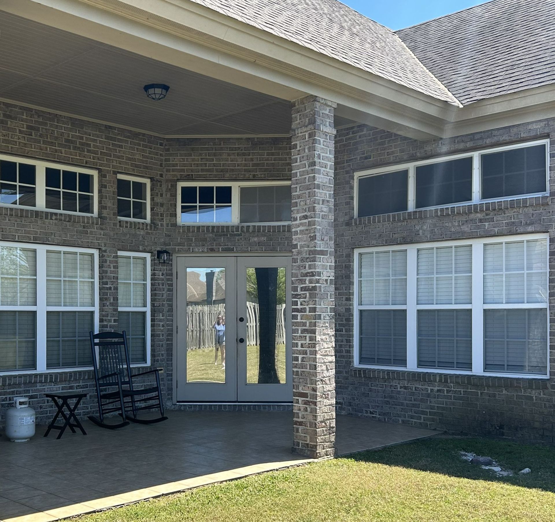 home window tinting in Deer Creek - Heat with aggravatingly bright UV Sunlight has been blocked from the home transom windows. Deer Creek in Montgomery AL