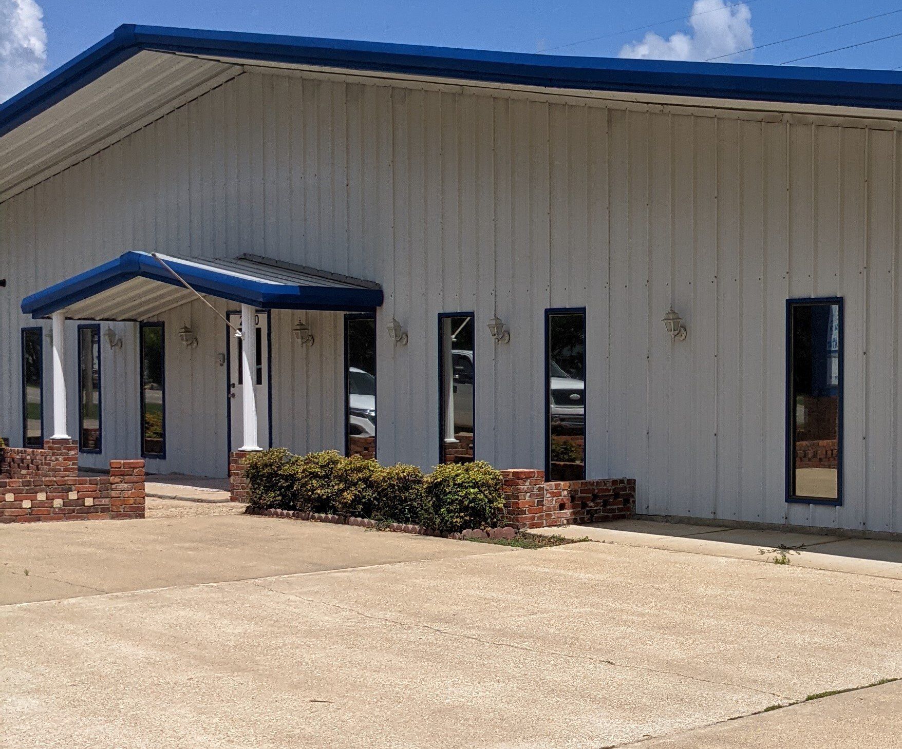 store window tinting in AL - Heat & Bright Sun were out of control inside this office in Millbrook Alabama.