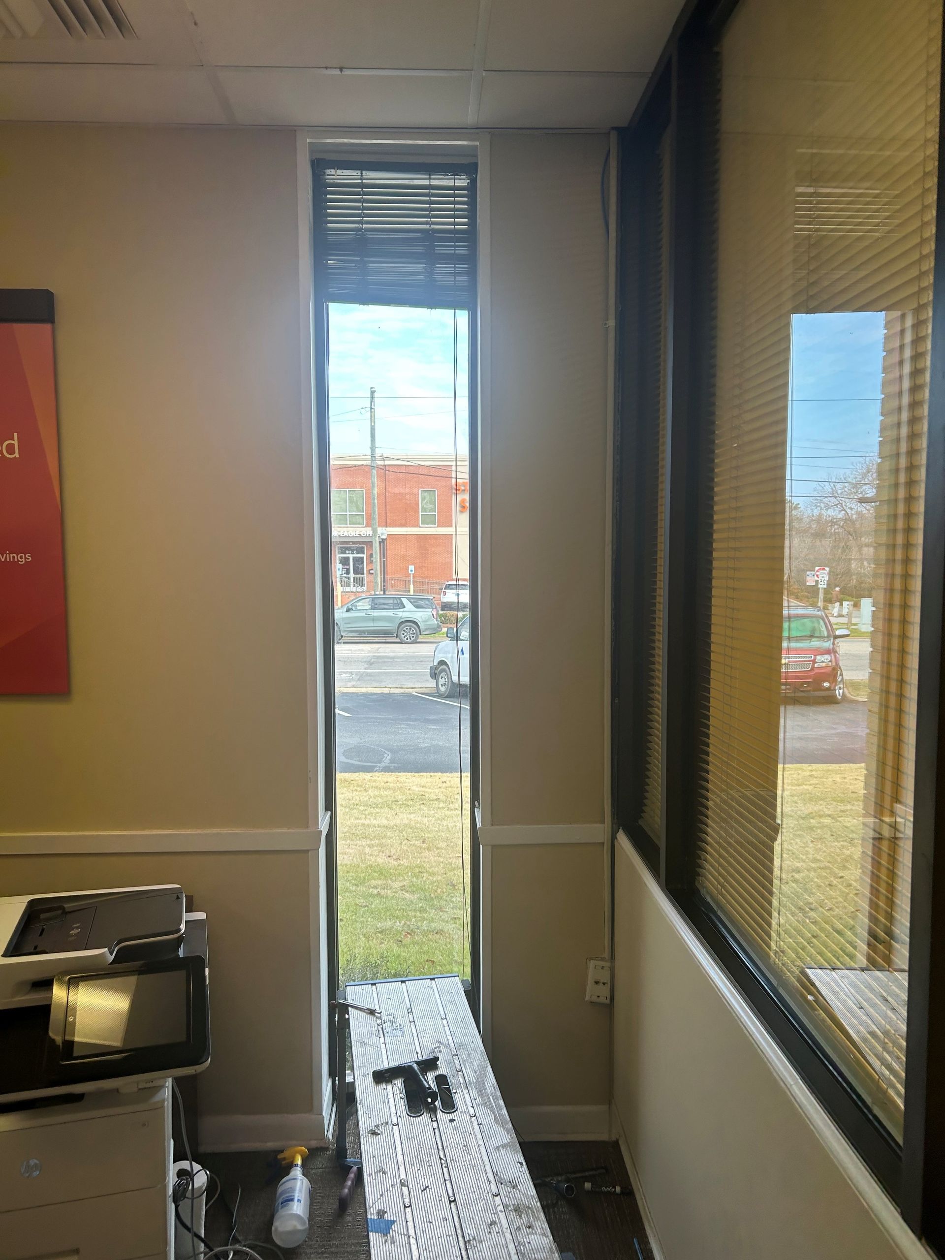 new window - Two-way clear SPF Tint stops UV-light harm along with bright Sun glare and heat gain at Wells Fargo in Auburn, AL